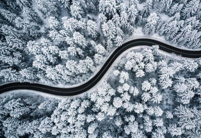 Lenvi - Arial view of icy forest